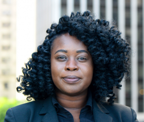 Patrice Oseni, CUNY Law student, smiles at camera
