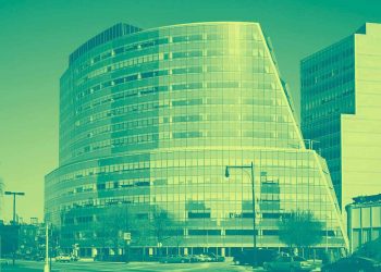 A street view photo of the CUNY Law School, colorized in hues of green and blue.