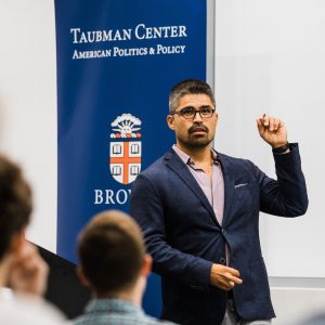 Cristian Farias '14 presents to an audience while a Senior Fellow at the Institute to End Mass Incarceration at Harvard Law School