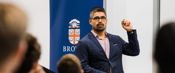 Cristian Farias '14 presents to an audience while a Senior Fellow at the Institute to End Mass Incarceration at Harvard Law School