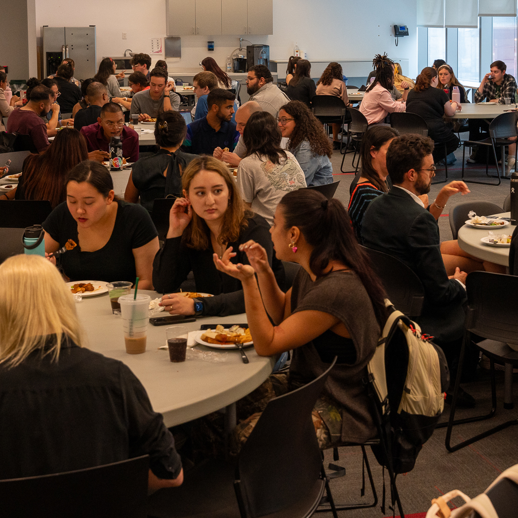 Students eating and mingling at Student Activities luncheon