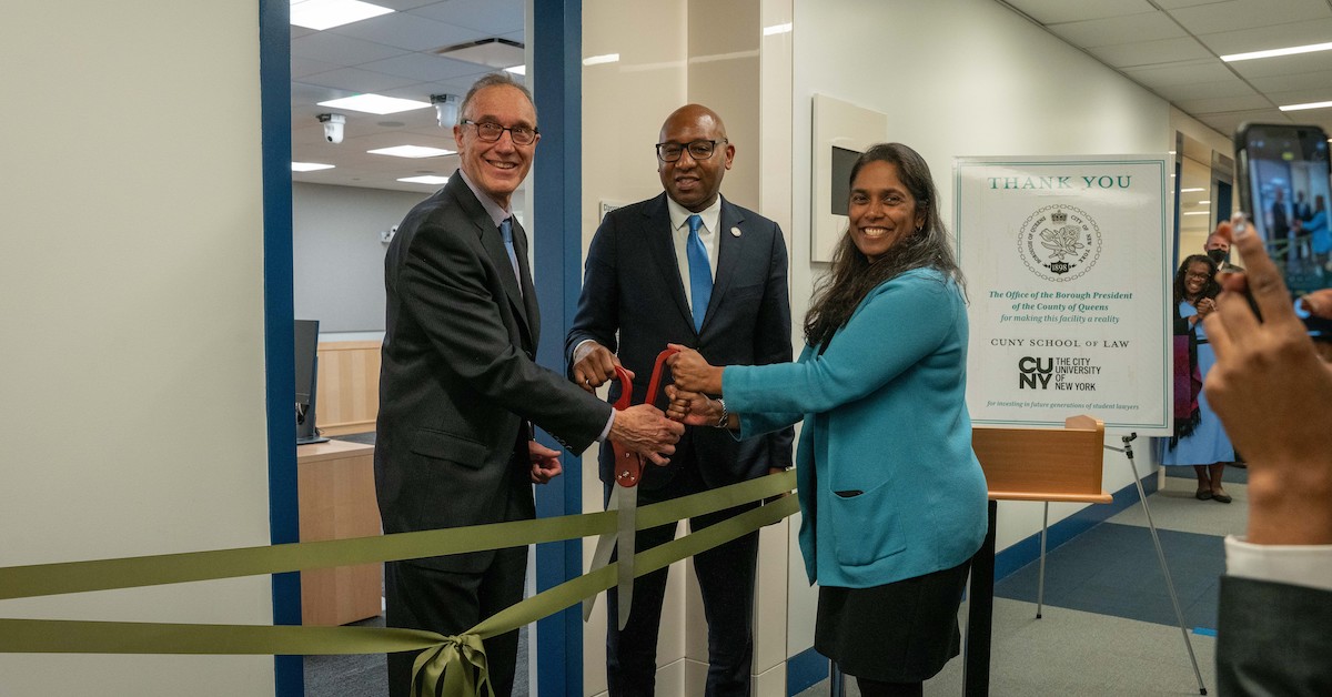 Prof. Merrick Rossein, Borough President Richards, Jr., and Dean Sudha Setty preside over the ribbon cutting for the new Trial Courtroom