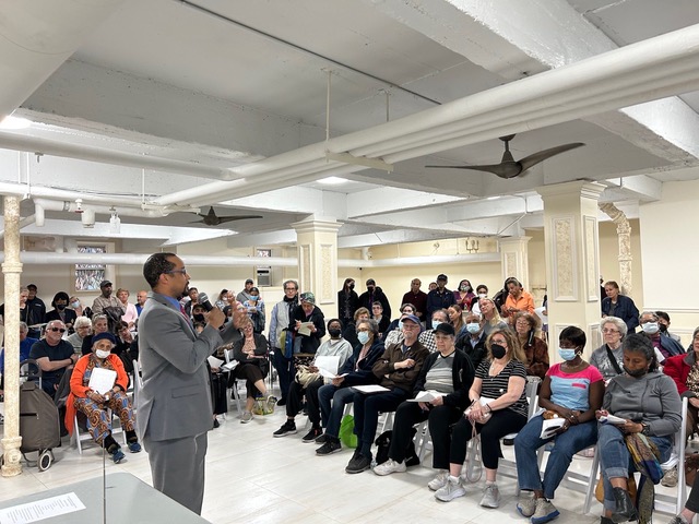 City Counseling Attorney Keith Allen ’09 addresses a crowd of New Yorkers