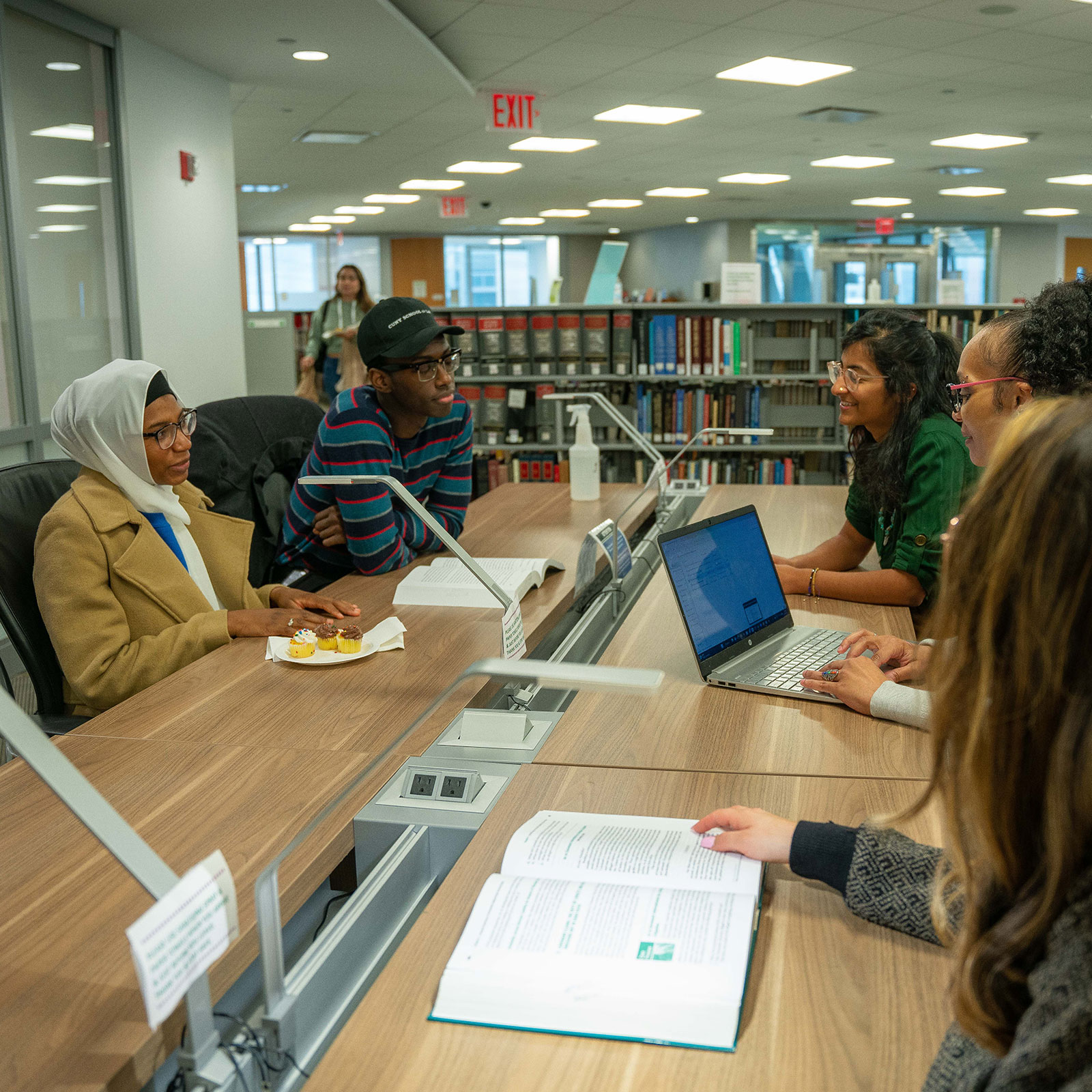 Students sitting around library table