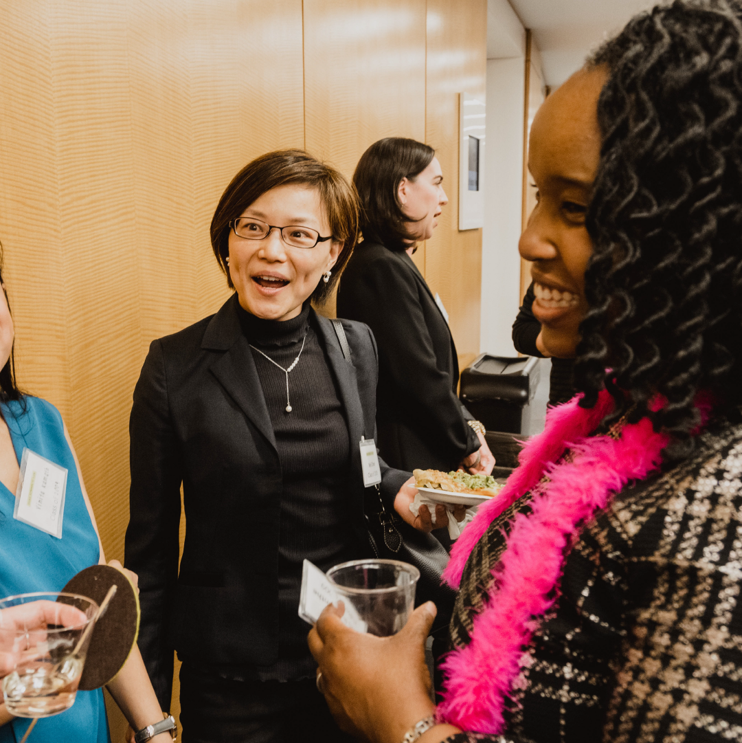 People mingling in the CUNY law hall