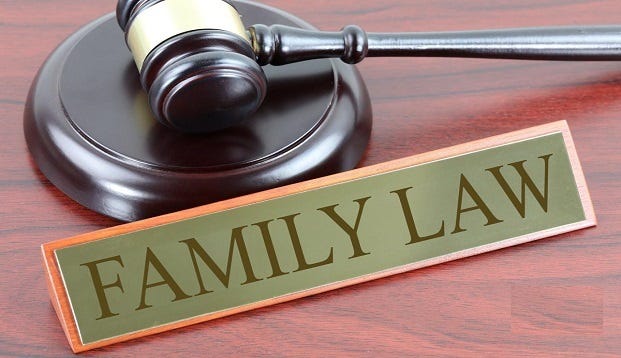 Family Law name plate in front of a gavel