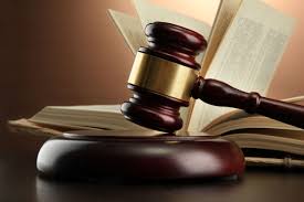 gavel in front of law books