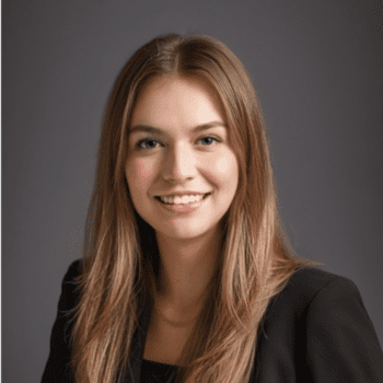 A smiling woman with long brown hair