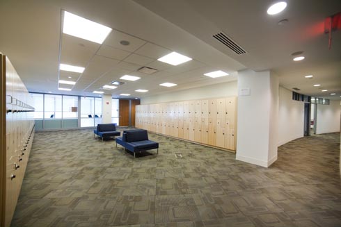 Very large hallway with walls lined with lockers