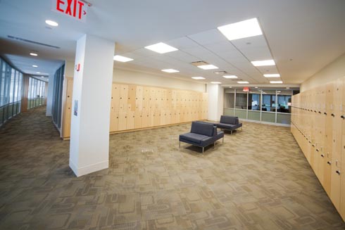 Very large hallway with walls lined with lockers