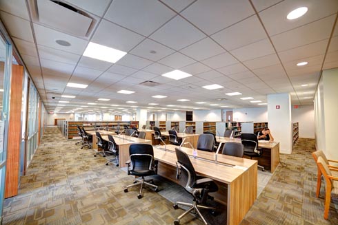Study tables and desks in the center of library