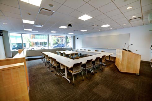 moot courtroom with a judges stand and tables and chairs for participants