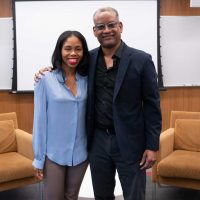 Vince Warren poses for a photo with author Derecka Purnell.