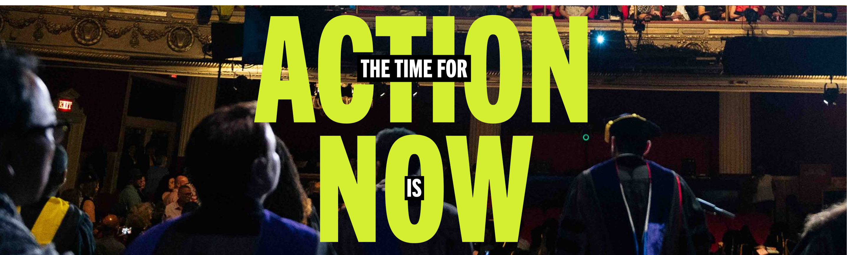 Graduation ceremony with large text: The time for action is now.